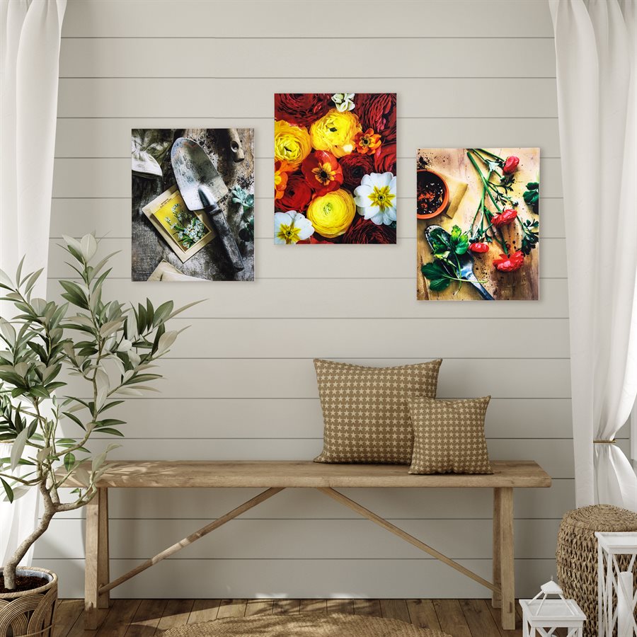 Canvas art print set of three photographs showing garden tools, vibrant florals, and food styling displayed in farmhouse entryway