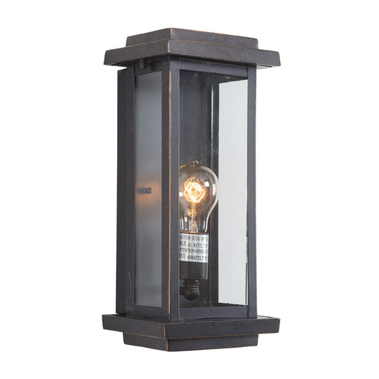 Outdoor wall light with oil rubbed bronze finish, clear glass panels, and rectangular frame.
