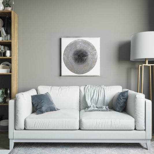 Abstract wall art featuring a grey stone-like circular design centered on a light blue background, square format canvas print measuring 27.6 inches