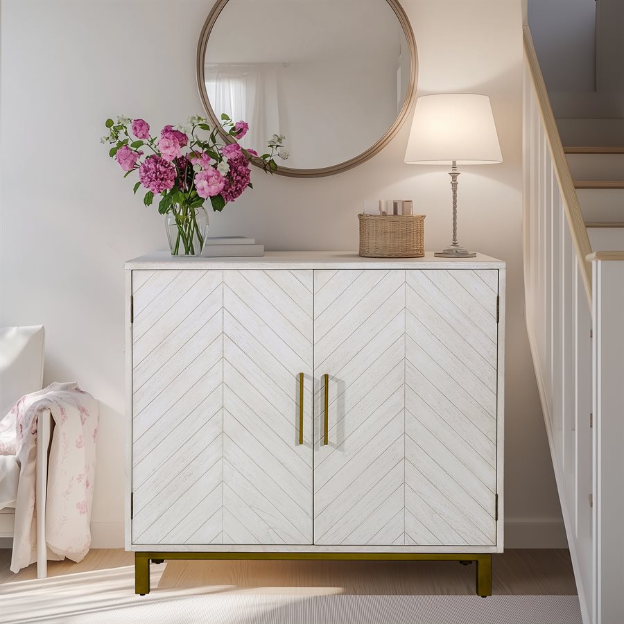 Modern white console table with herringbone design, brass hardware, and green base featuring decorative mirror and lamp in contemporary entryway